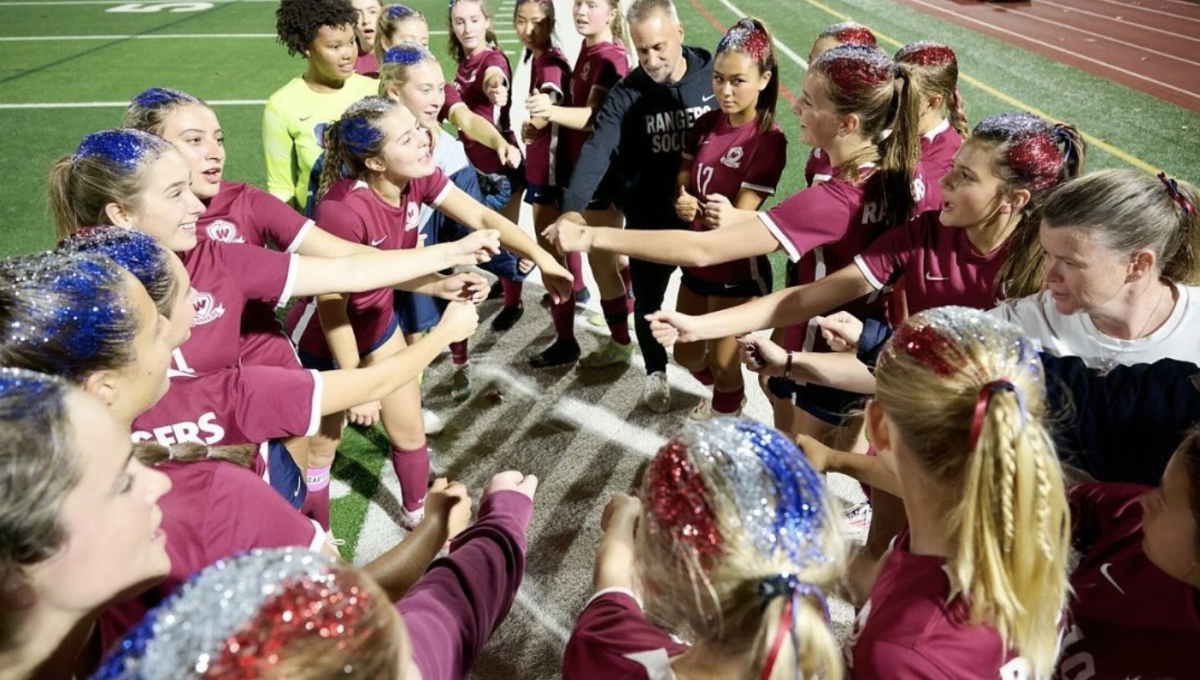 Picture of the 2024 Rangers Girls Soccer team before one of their games. 